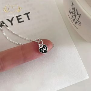 dây chuyền trái tim khắc nơ thanh lịch